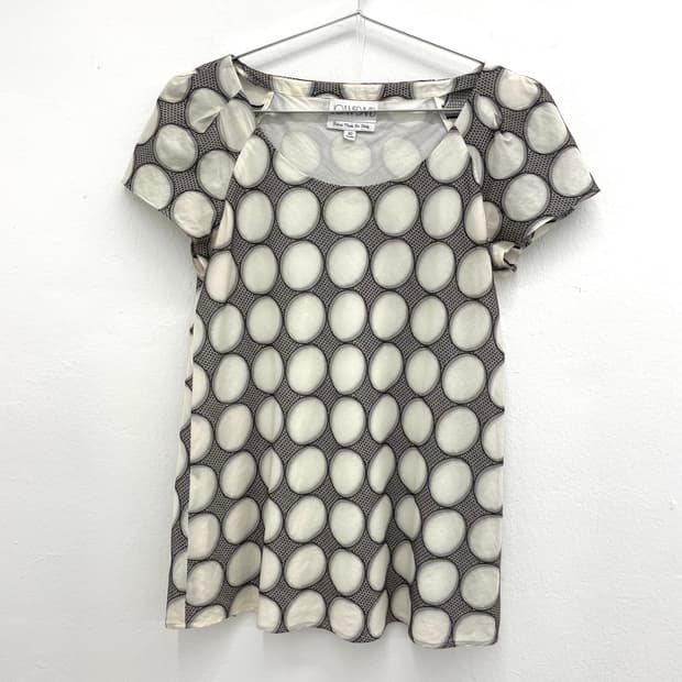 Abstract circle print cap sleeve blouse