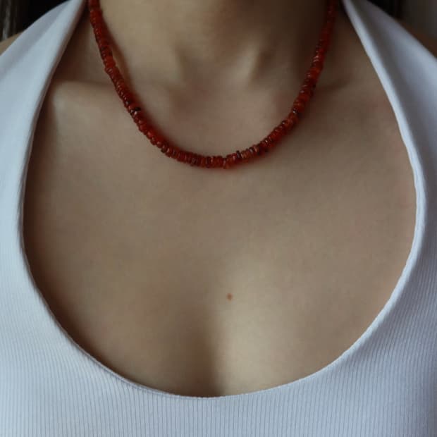 red seed necklace