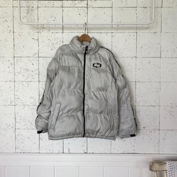 L 네스티킥 패딩 점퍼