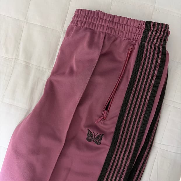 니들스 트랙팬츠 스모키핑크