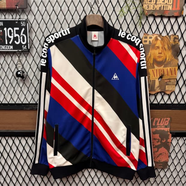 르꼬끄 스포르티브 스트릿 패턴 트랙 자켓 사이드 로고 포인트 배색