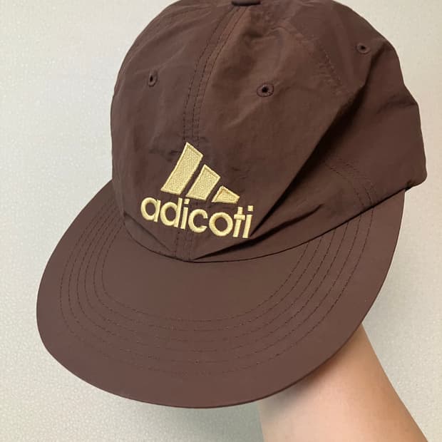 오티코티 아디코티 굿즈 6패널캡 나일론캡 모자 브라운