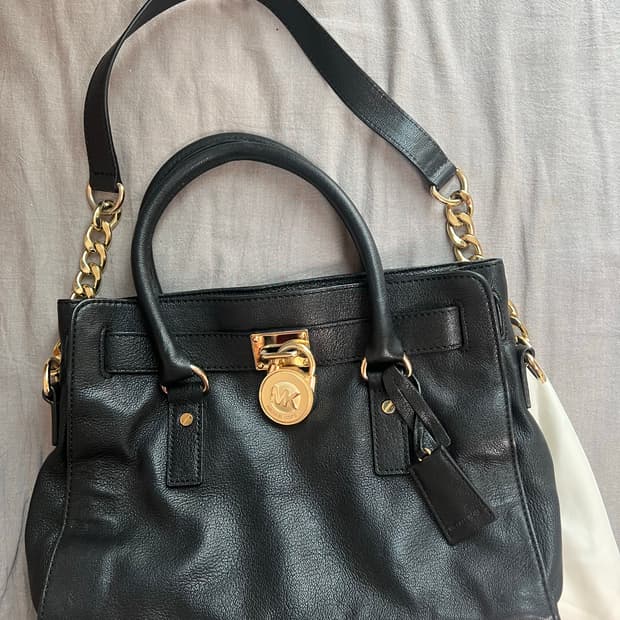 마이클코어스 양가죽 백