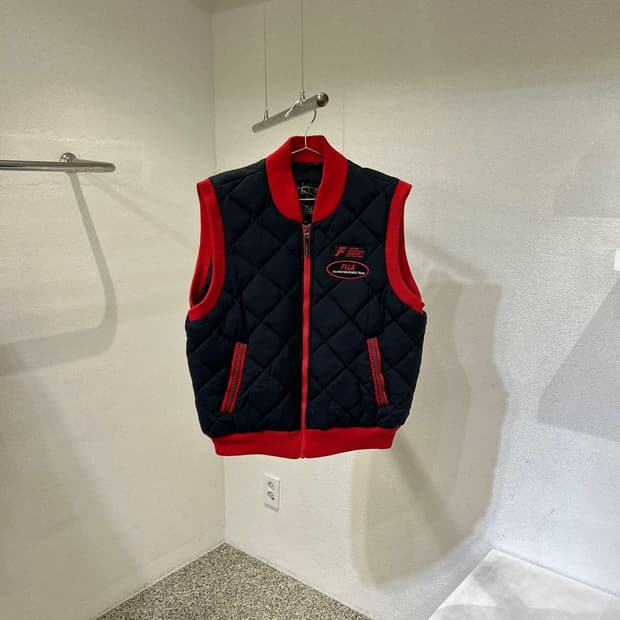 휠라 퀄팅 조끼패딩