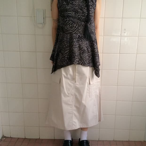 Unbalanced pattern sleeveless