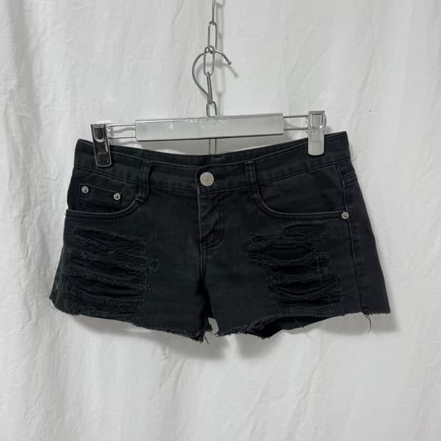 Distressed black denim shorts