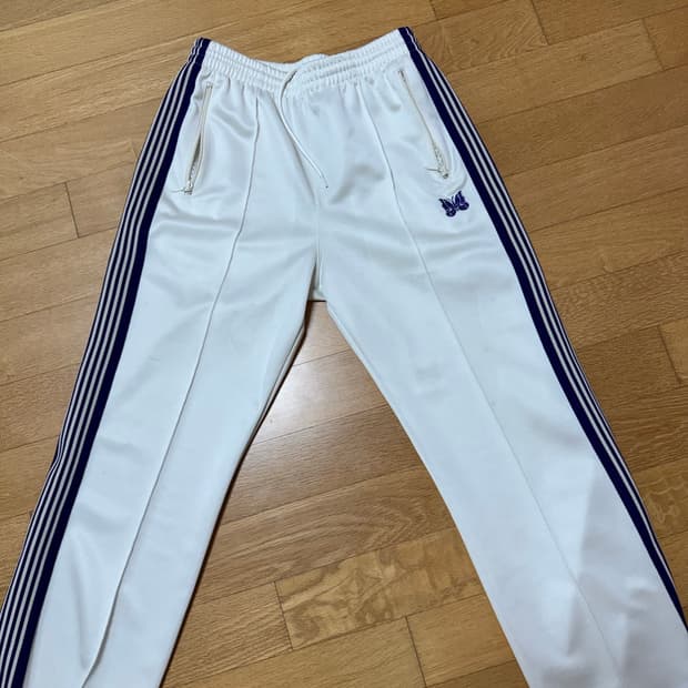 니들스 트랙팬츠