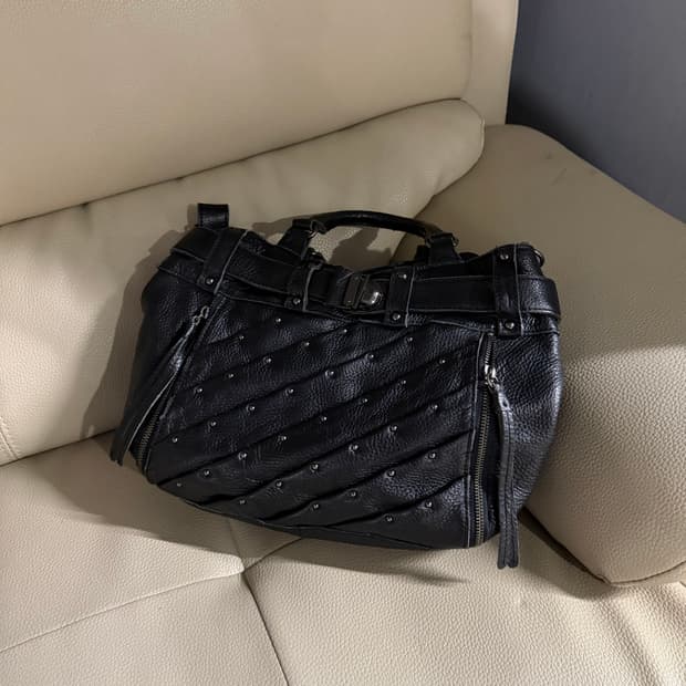 stud detail strap point real leather bag