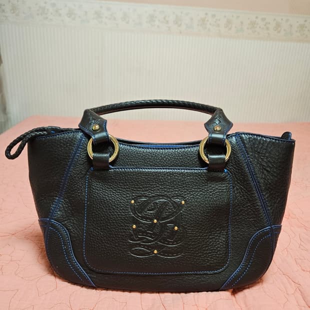 새상품. 루이까또즈 가죽 토드백