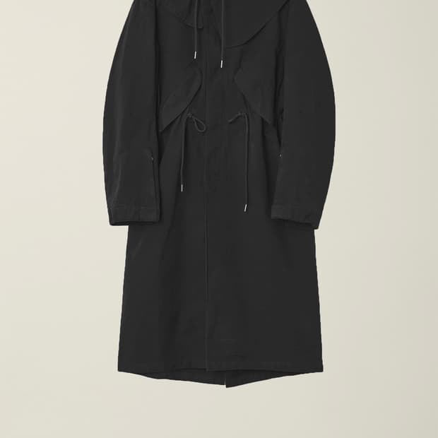 누마레 EE GARMENT DYED CURVED FISHTAIL COAT