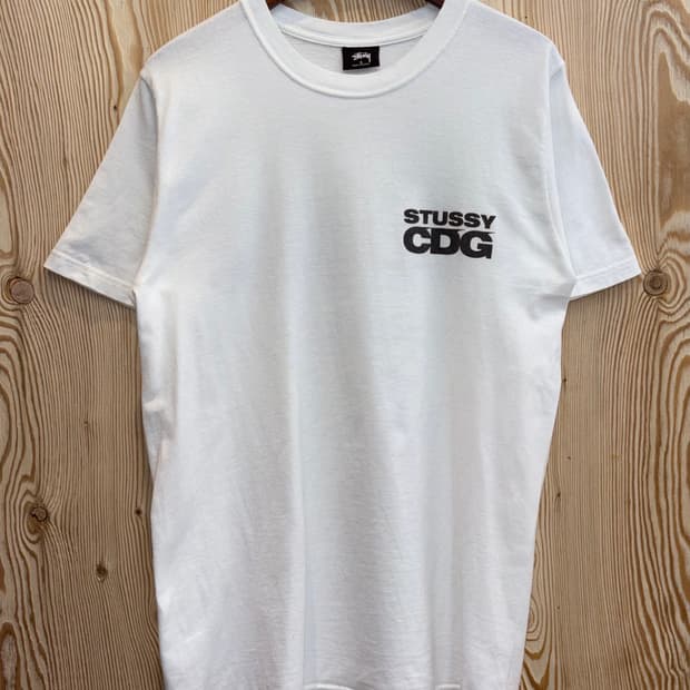 스투시xCDG 서프맨 티셔츠 