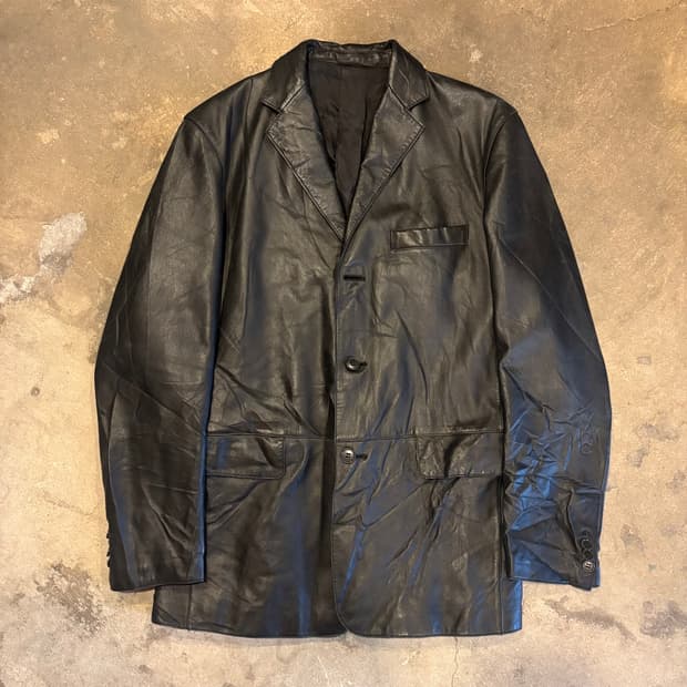 꼼샤이즘 레더 자켓