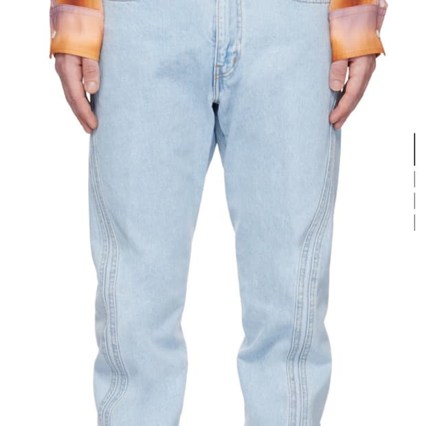 NVRFRGT twisted denim jeans