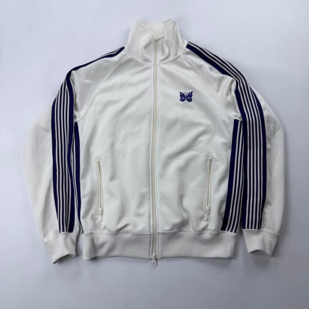 니들스 트랙 자켓 아이스화이트 퍼플라인