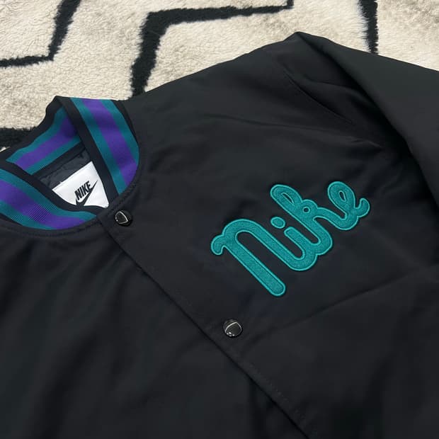 [M]나이키 덕아웃 새틴 바시티/블랙