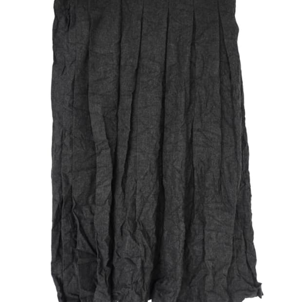 에옹쓰 Paper Wool Offbeat Pleats Skirt 