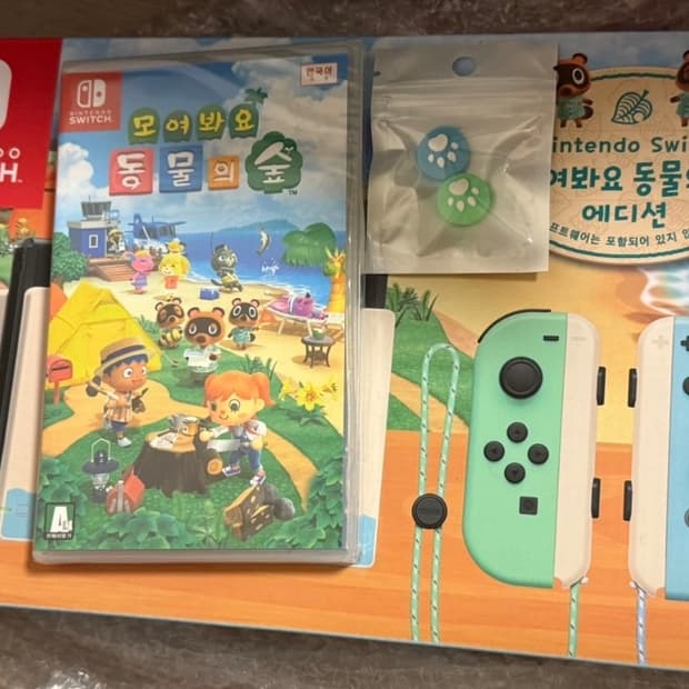 미개봉 닌텐도 스위치 동물의숲에디션 + 동숲 팩