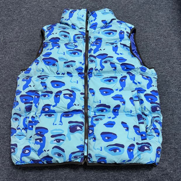 키드수퍼 페이스 카모 푸퍼 패딩 조끼