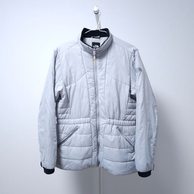 노스페이스 라이트그레이 경량패딩 100