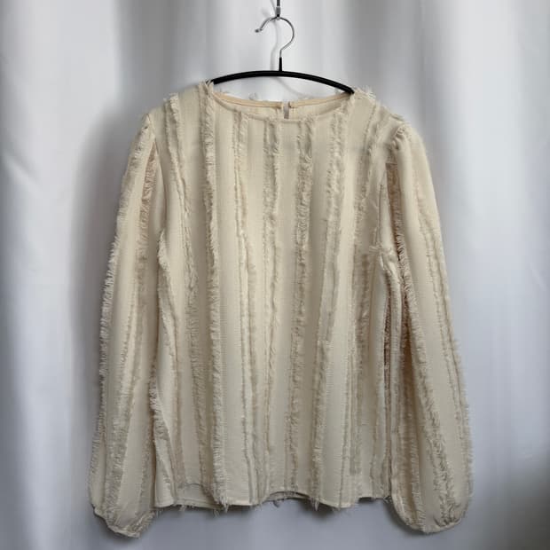 cream fringe blouse