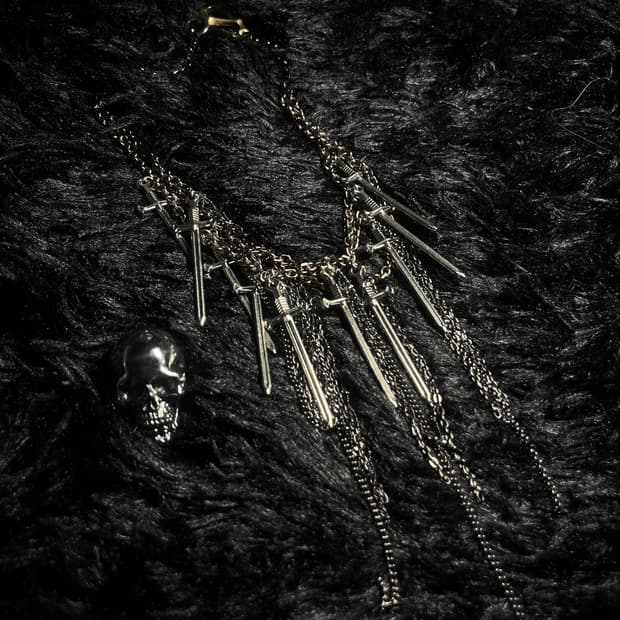 A sword layering necklace