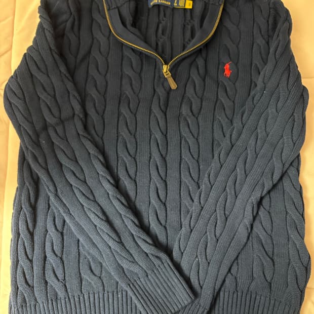 폴로 반집업 니트
