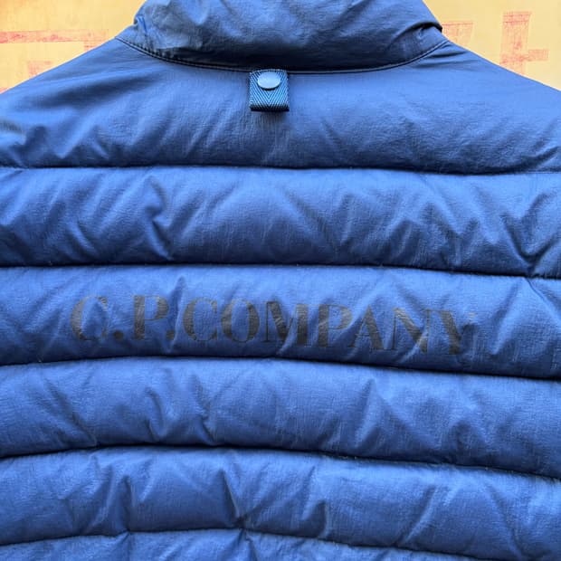 씨피컴퍼니 백로고 경량 푸퍼 자켓