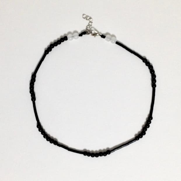 Black seed point necklace