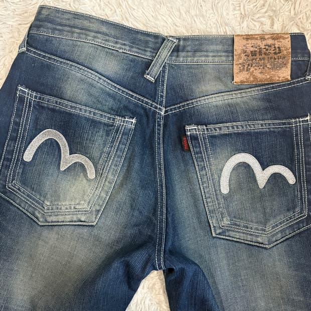 [32] 에비수 은색로고 플레어진 청바지 