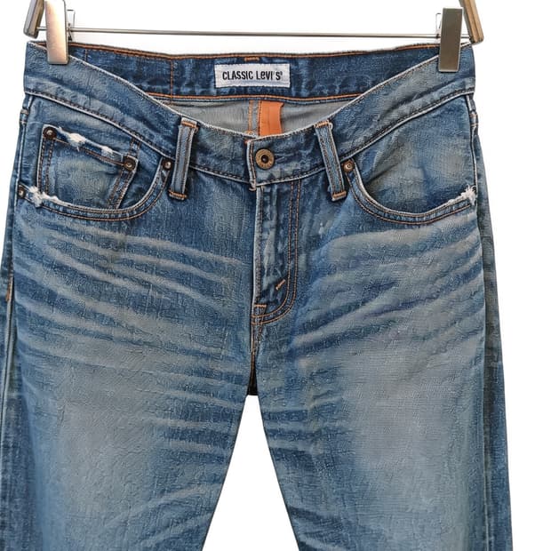 Levi's 502 워싱 테이퍼드 프린지 데님펜츠