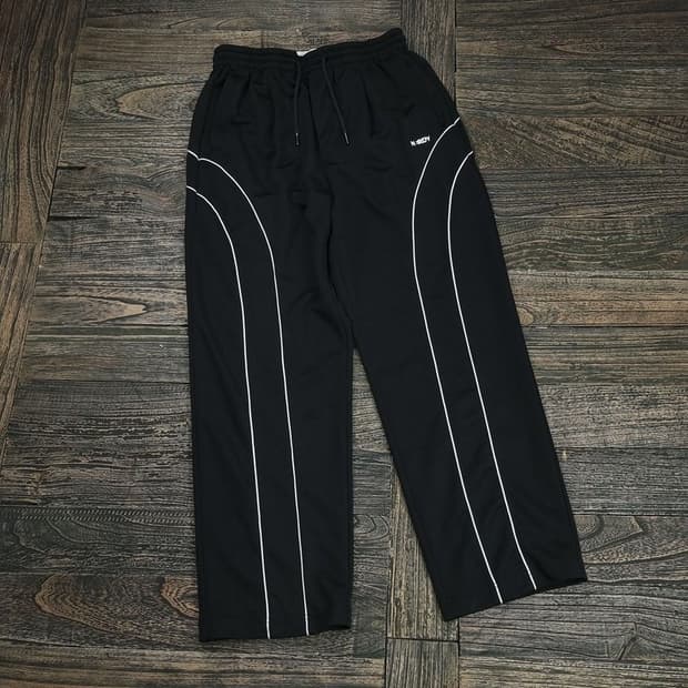 [NERDY] 널디 라인 파이핑 트랙 팬츠 블랙 M16389 