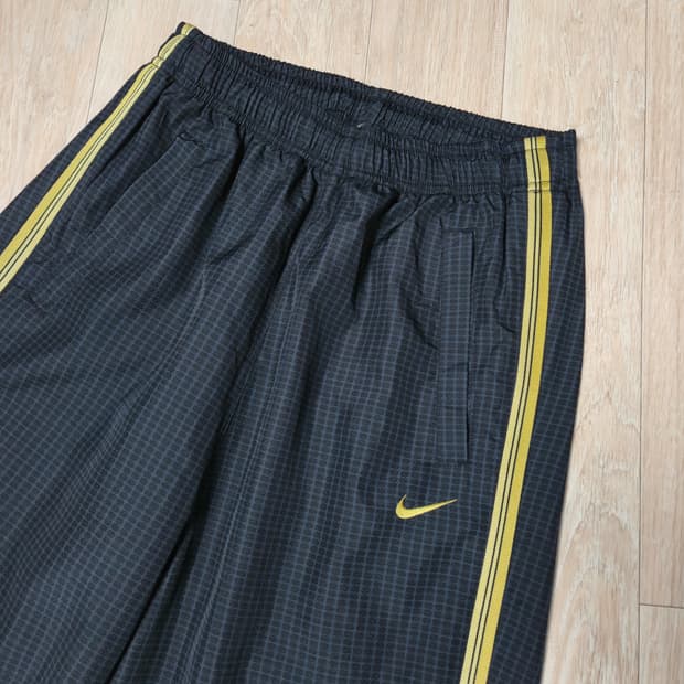 나이키 블랙/골드 체크 트랙 팬츠