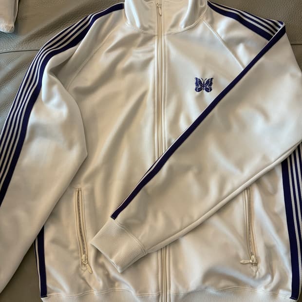 니들스 트랙 자켓 아이스 화이트