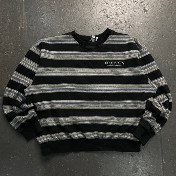 100 스컬프터 크롭 니트