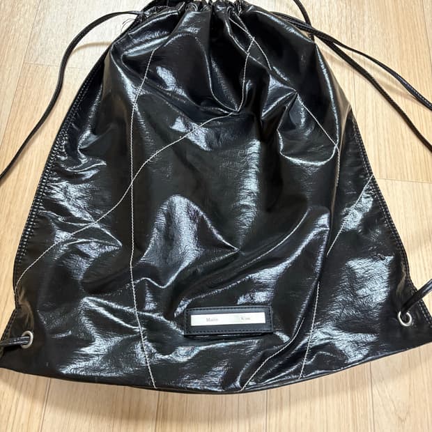 마뗑킴 스트링 코팅 백팩