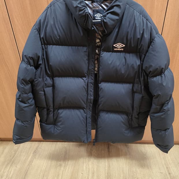 엄브로 플라이트 패딩