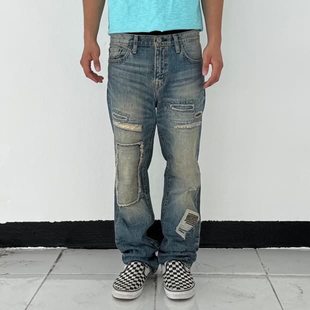 Levi’s 리메이크 디스트로이드 패치워크 워싱 데님 팬츠