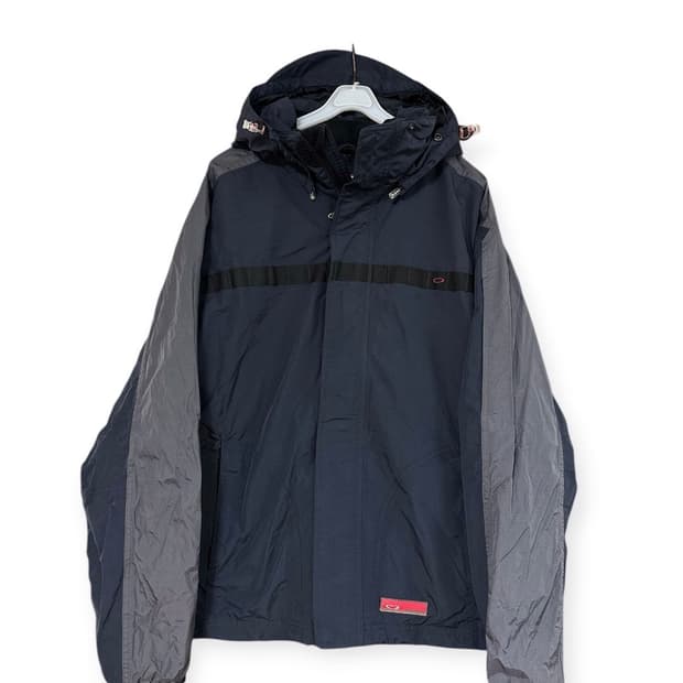 오클리 테크니컬 블랙 바람막이 점퍼