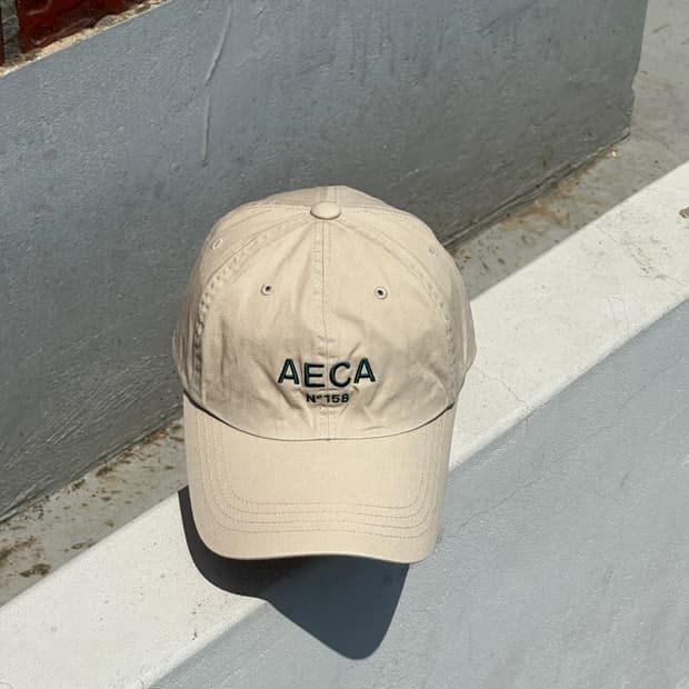 [F] AECA 에이카화이트 베이지 볼캡 모자