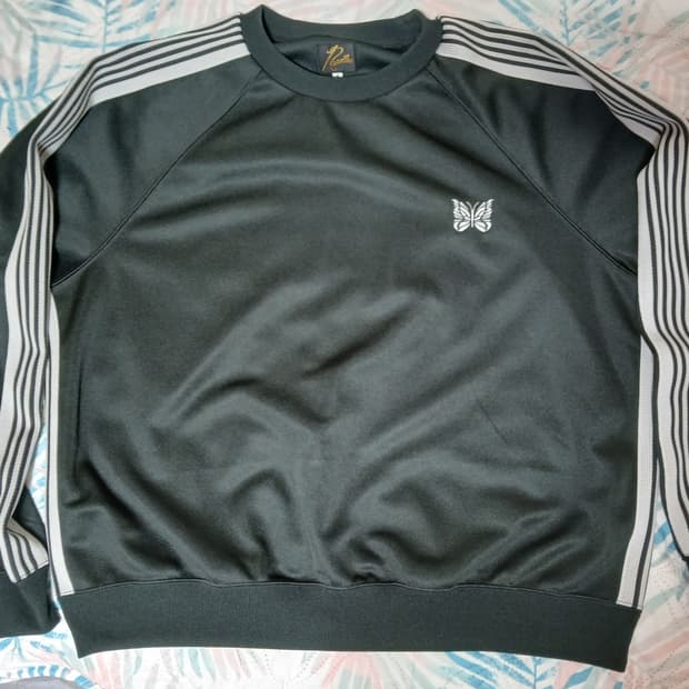 니들스 스웻셔츠