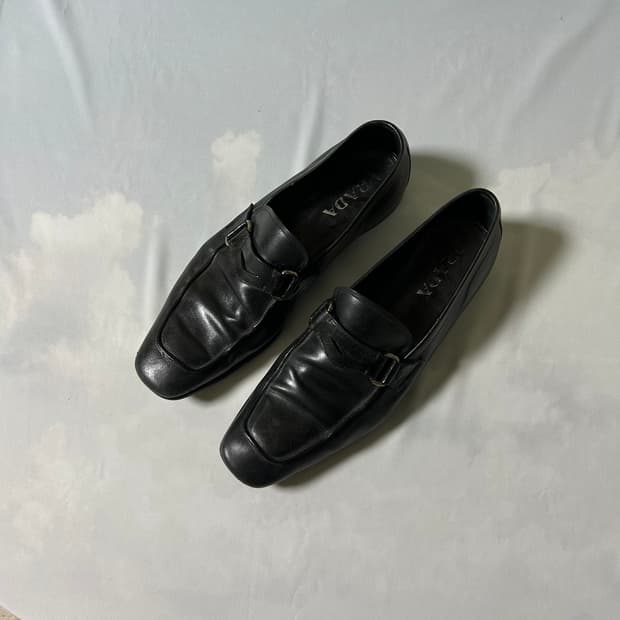 Prada buckle strap loafers