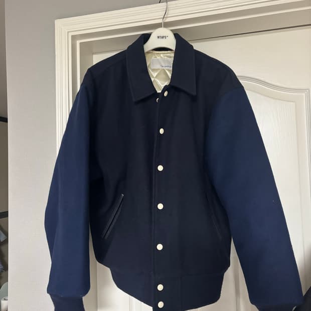 [M] 나나미카 x 골든베어 울 바시티 24fw