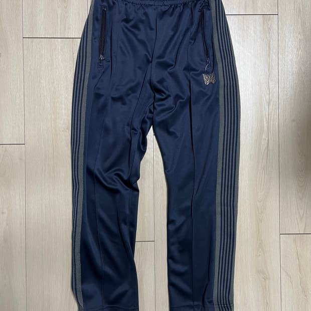 니들스 트랙팬츠