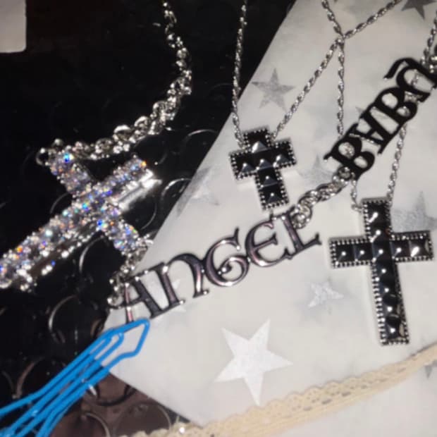 t.e.e.n.y angel baby necklace