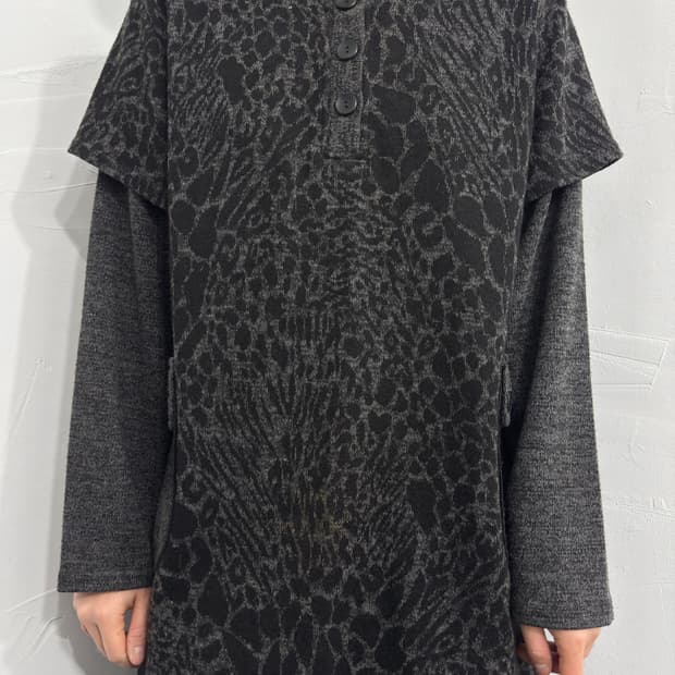 across black leopard layered top