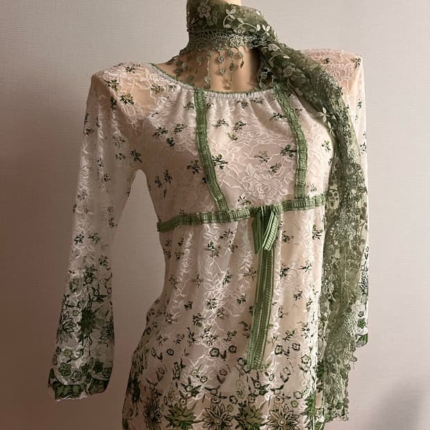 See-through green blouse
