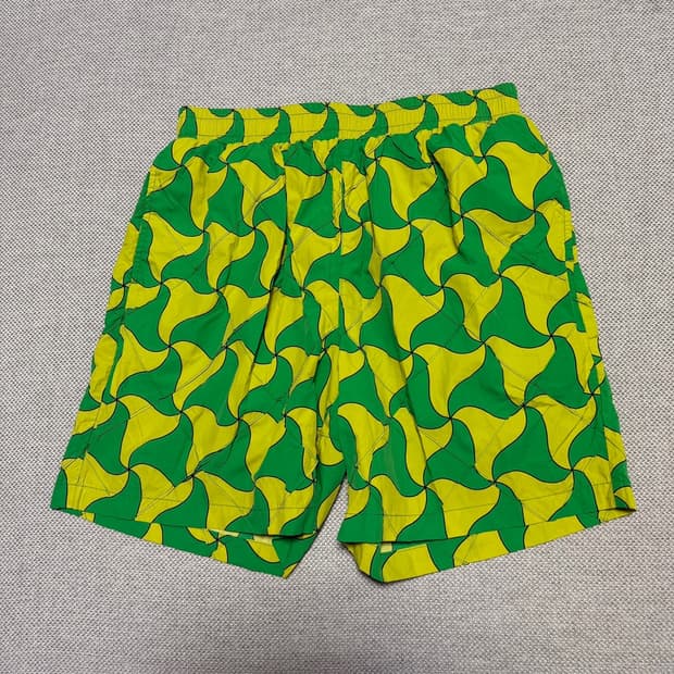 보테가 베네타 웨이비 트라이앵글 패턴 퀼팅 스윔팬츠