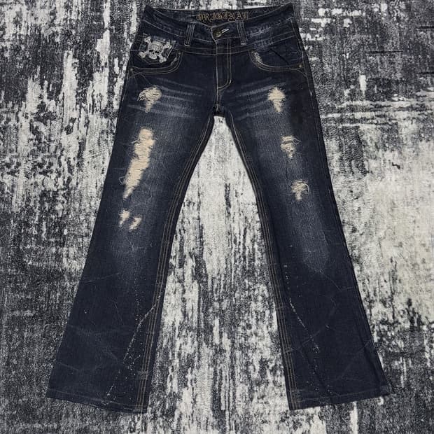 {UNKNOWN} Skull Patch Flare Jeans