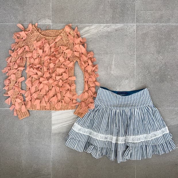 Mute orange ribbon trimmed loose knit