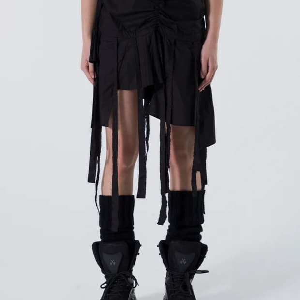 엘이이와이 UNBALANCE TASSEL SKIRT 